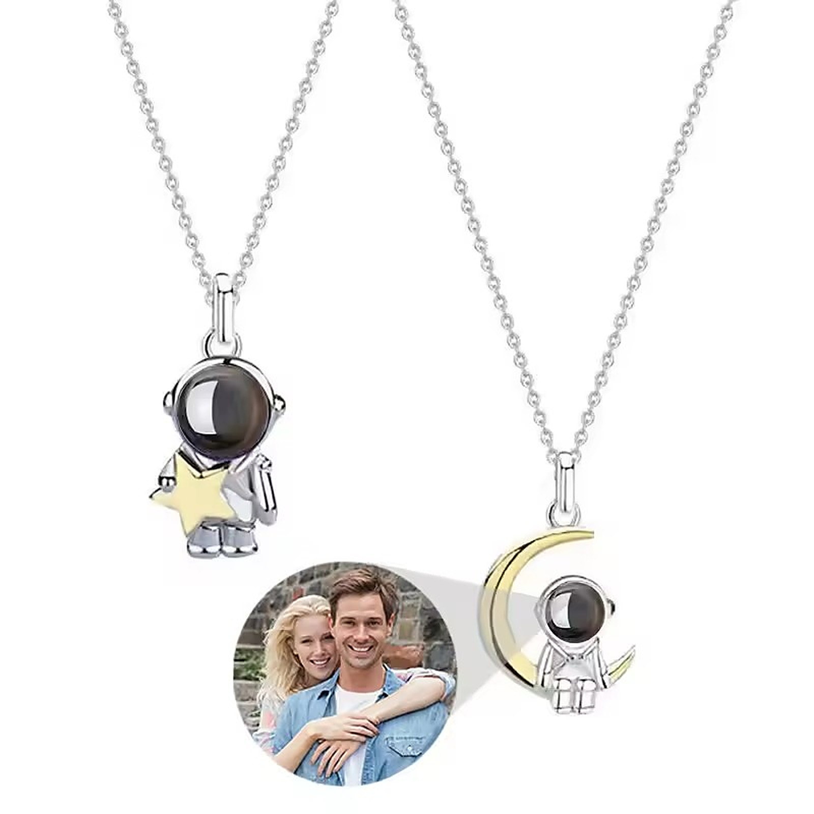 Pair of silver photo projection necklaces
